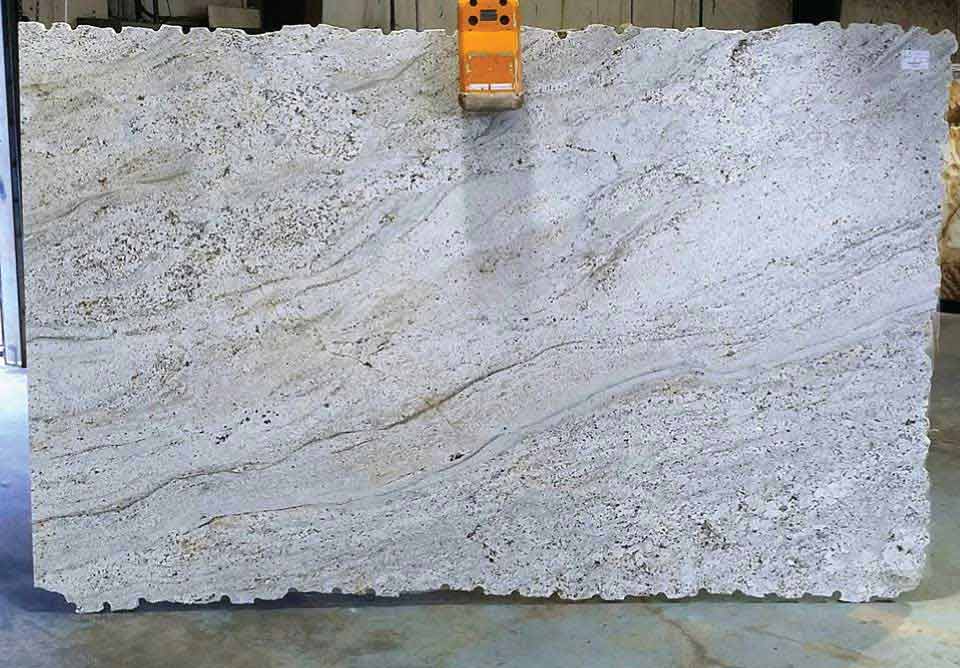 Natural stone granite slab with unique veining and color variations.